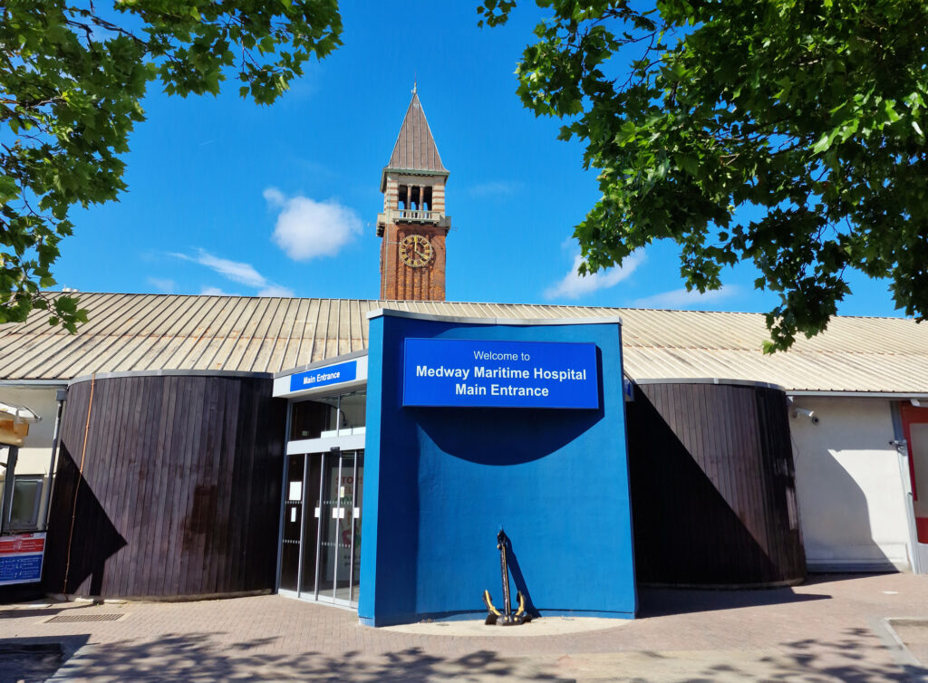 Medway Maritime Hospital main entrance with blue sky behind