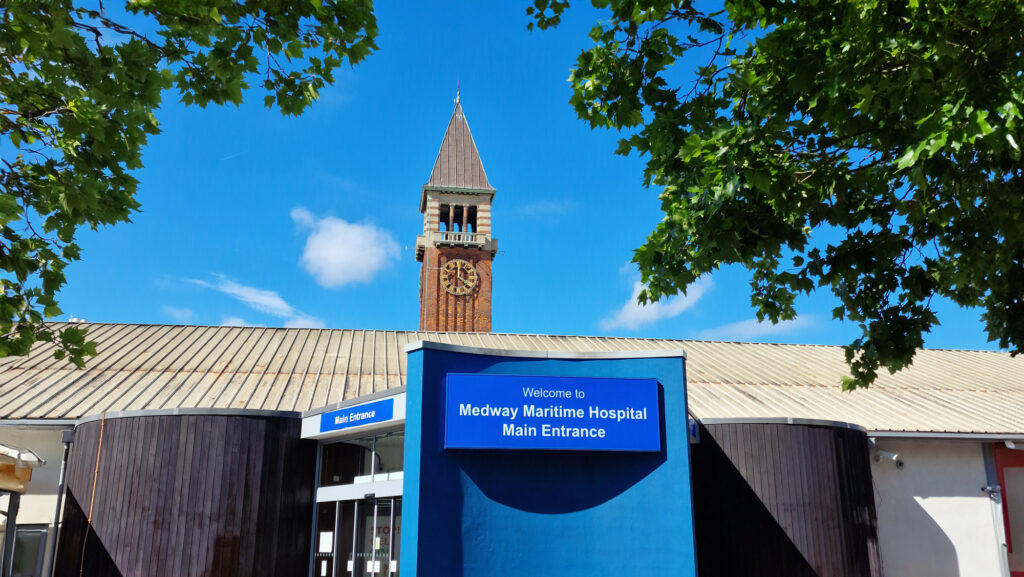 Medway Maritime Hospital main entrance with blue sky behind
